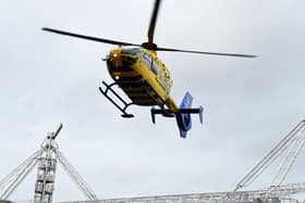 A man was airlifted to hospital after getting stuck under a tractor in Buxton. Photo: Neil Cross.