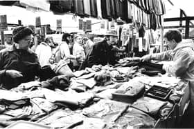 Visitors to Bakewell Market are pictured looking for some bargains in 1976.