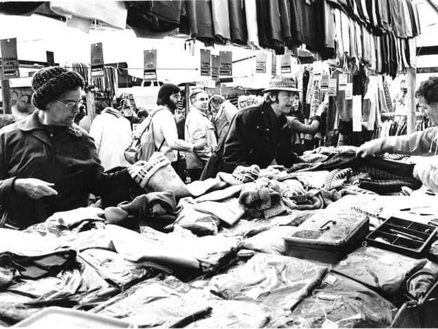 Visitors to Bakewell Market are pictured looking for some bargains in 1976.
