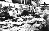 Visitors to Bakewell Market are pictured looking for some bargains in 1976.
