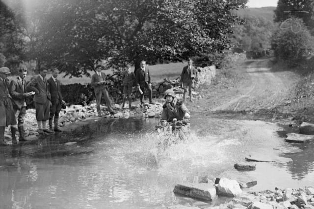 A watersplash in the International Reliability Trials for motorbikes, at Buxton in August 1926.