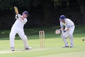 Adam Critchlow scored a fine century for Dove Holes on Saturday.