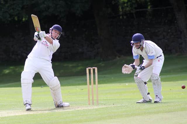 Adam Critchlow scored a fine century for Dove Holes on Saturday.