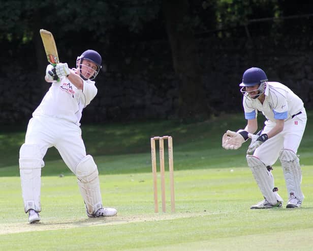 Adam Critchlow scored a fine century for Dove Holes on Saturday.