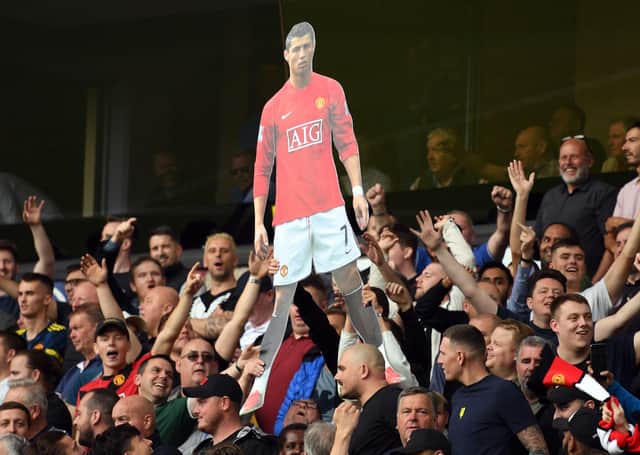Manchester United hope Cristiano Ronaldo, confirmed as a new signing on deadline day, will be more effective than the version in the crowd at Molineux last weekend.
