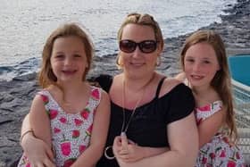 Gemma Ellis and her two daughters Scarlett  and Ruby who will be cutting the ribbon with their mum as she opens a new charity shop in Chapel-en-le-Frith on Saturday