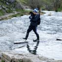 These visitor to the Dovedale stepping stoneson Friday, November 24, had to tread carefully. (Photo: Rod Kirkpatrick/RKP Photography)