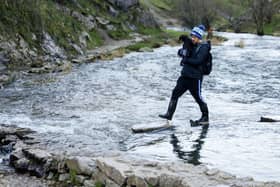 These visitor to the Dovedale stepping stoneson Friday, November 24, had to tread carefully. (Photo: Rod Kirkpatrick/RKP Photography)