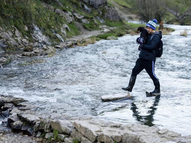 These visitor to the Dovedale stepping stoneson Friday, November 24, had to tread carefully. (Photo: Rod Kirkpatrick/RKP Photography)