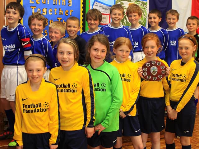 Fairfield Endowed Junior School's winning girls five a side football team and the boys team who came second.