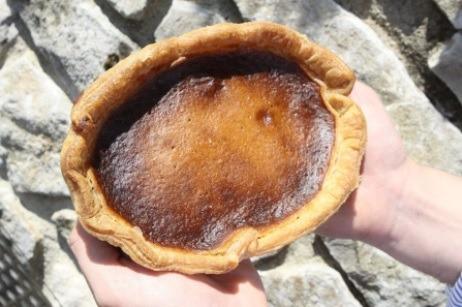 A traditional almond and jam pudding is named after which town, unofficially named as the capital of the Peak District?