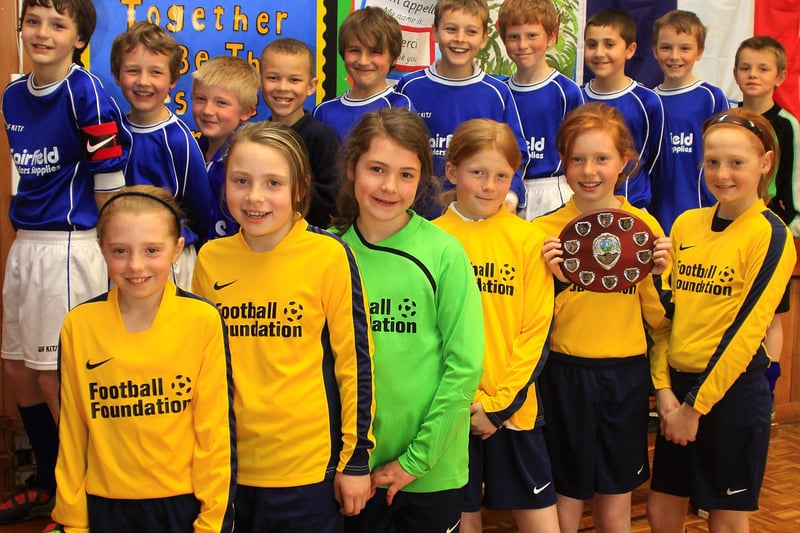 Fairfield Endowed Junior School's winning girls five a side football team and the boys team who came second