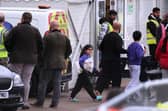 Detainees are seen inside the Manston holding centre for asylum seekers. Immigration minister Robert Jenrick this week vowed "more radical" policies to counter illegal migration.