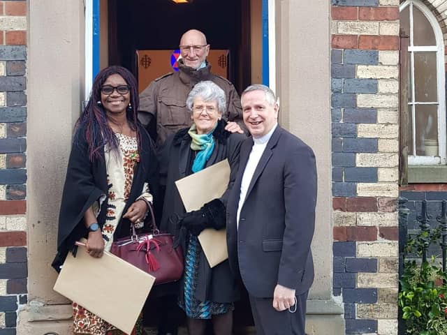 Reverend Keith Sandow with some of the invited guests at Fernilee Methodist Church.