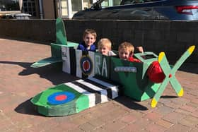 The boys in the replica Spitfire