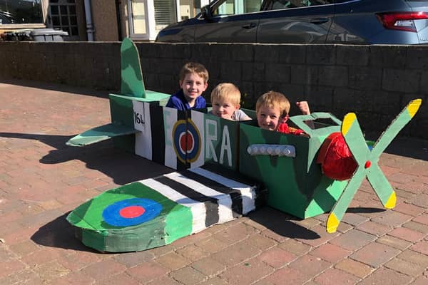 The boys in the replica Spitfire