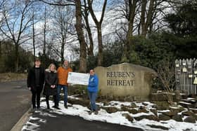 High Peak Board Gamers present cheque to Reuben's Retreat