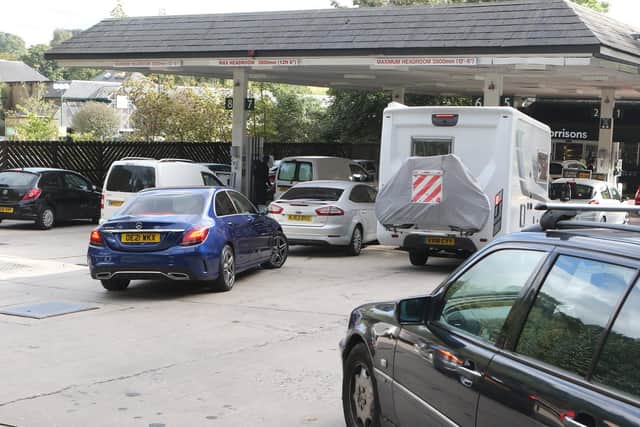 Motorists queuing to fill up their cars at Morrisons