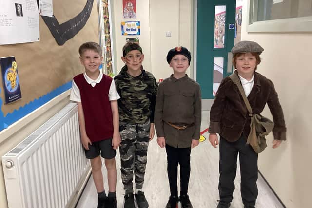 Pupils dressed up in wartime clothing
