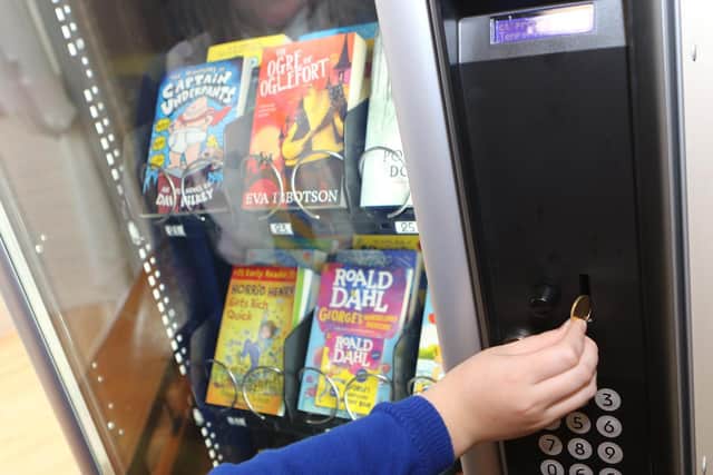 The new book vending machine and tokens