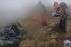 The Mountain Rescue Team traced the walkers using their mobile phones and found them attempting to shelter in a tent.