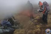 The Mountain Rescue Team traced the walkers using their mobile phones and found them attempting to shelter in a tent.