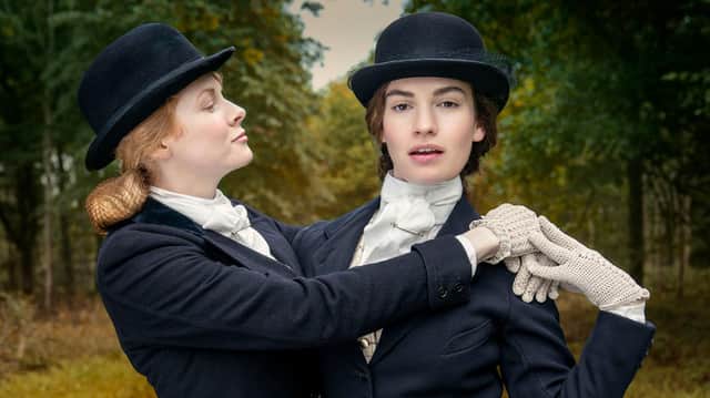 Emily Beecham (Fanny) and Lily James (Linda) in BBC 1's The Pursuit of Love. Photo credit:  Theodora Fims & Moonage Pictures Limited/ Robert Viglasky.