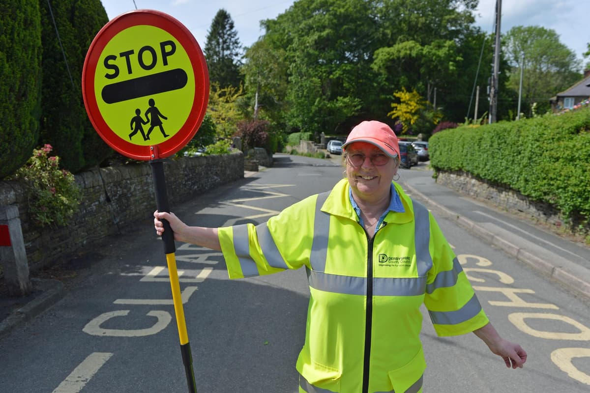 Lollipop lady’s fond farewell to Hayfield Primary pupils after 26 years
