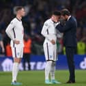 Gareth Southgate consoles Jadon Sancho after the penalties defeat to Italy.