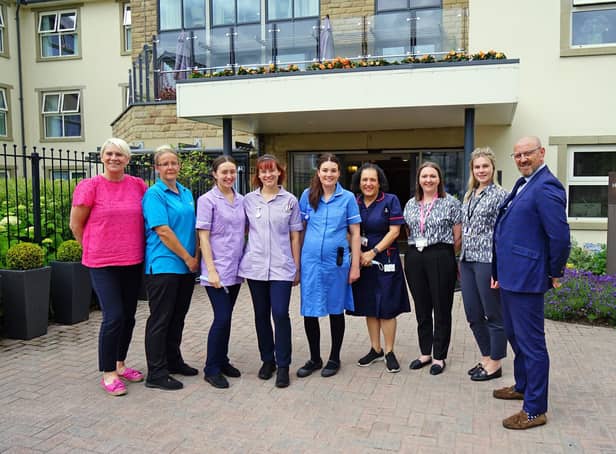 Sister of former resident at Haddon Hall care home sings the praises of the care home. Seen manager Mark Smith and staff.