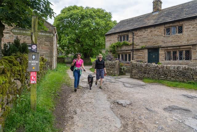 Walkers making their way into the village of Edale. Picture: James Hardisty.