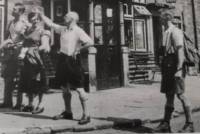 Fred Heardman, the landlord of the Nags Head Edale and Tom Tomlinson, the first full-time head warden of the newly formed Peak District National Park in 1956