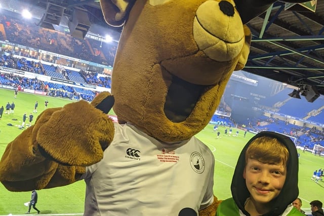 A fan had his picture taken with the Buxton FC mascot. Picture submitted