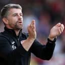 Stephen Robinson has warned his Morecambe players that they must improve if they want to avoid FA Cup embarrassment at Buxton. The Shrimps go into the game following a 4-0 defeat at MK Dons.