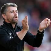 Stephen Robinson has warned his Morecambe players that they must improve if they want to avoid FA Cup embarrassment at Buxton. The Shrimps go into the game following a 4-0 defeat at MK Dons.
