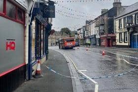 Police tape around the bus which was involved in a collision with a person on Buxton's High Street.  Pic submitted