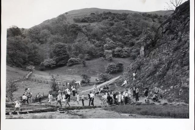 Visitors at Dovedale enjoy the views on 10th July 1968..With currency restrictions causing more people to holiday at home, the beauty of the English countryside is being discovered by more and more motorists.