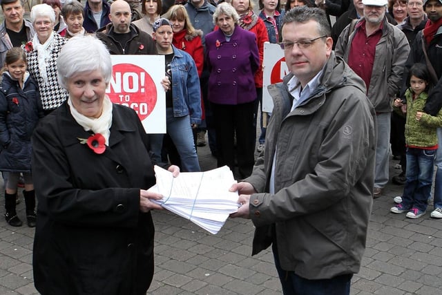 Mrs Patricia Green on behalf of the anti Tesco campaigners hands over their petition to borough councillor Chris Payne in November 2011. Photo Jason Chadwick