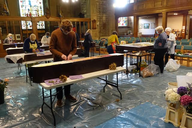 Petallers hard at work in St John's Church. Picture John Jansen