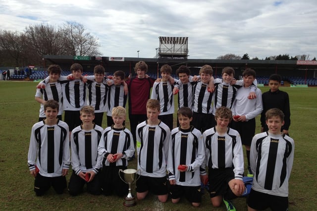 Buxton JFC Sharks U14s following their win in the J&S Trophies Cup Final at Alfreton Town FC's ground.
