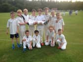 A former Buxton U11 team gather before a game. Did you play in this team?