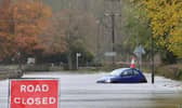 A swollen River Derwent floods a road in Darley Dale, Derbyshire. November 8, 2019. Picture: SWNS