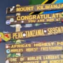 Ian Clemson at the top of Mount Kilimanjaro.
