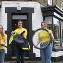 Carly Barnes, Matthew Howarth and Rebecca Mills outside the Thomas Theyer Foundation shop on London Road which they are trying to raise funds for so they can purchase. Pic Jason Chadwick