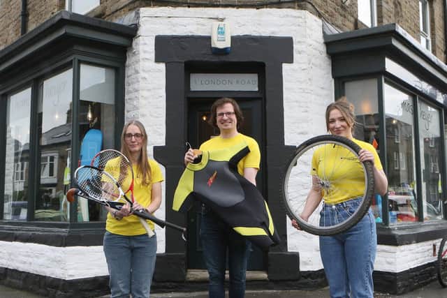 Carly Barnes, Matthew Howarth and Rebecca Mills outside the Thomas Theyer Foundation shop on London Road which they are trying to raise funds for so they can purchase. Pic Jason Chadwick