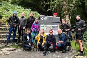 Matt Heywood, in the red hat, with his teammates on the first leg of the challenge in Wales.