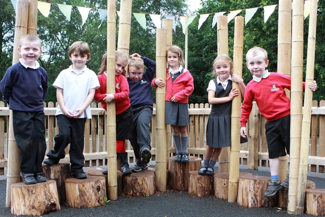 The reception pupils at Hayfield Primary trying out their new outdoor play area in 2011. Photo Jason Chadwick