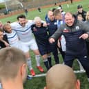 Buxton FC celebrations after their win all but secures the championship