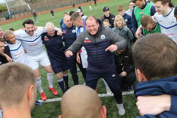 Buxton FC celebrations after their win all but secures the championship