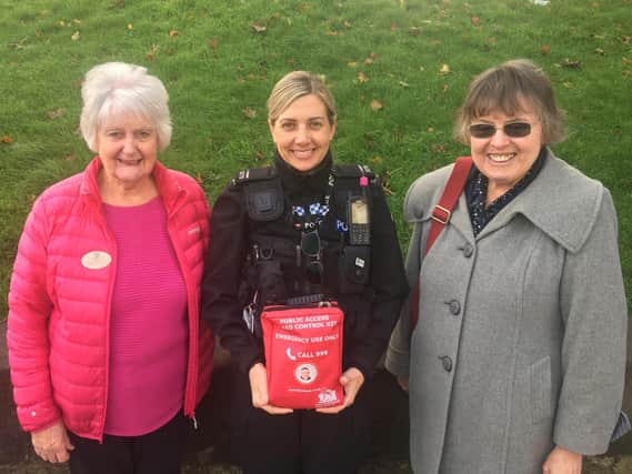 PC Lora Holdgate receives a Public Access Bleed Control Kit from Inner Wheel Club of Buxton Joint Presidents Lynda Wright and Mary Davies (left) for the Queen's Head pub.